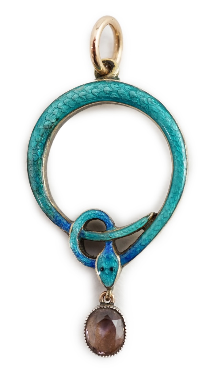 A late 19th/early 20th century Child & Child, parcel gilt silver, enamel and simulated diamond set drop serpent pendant